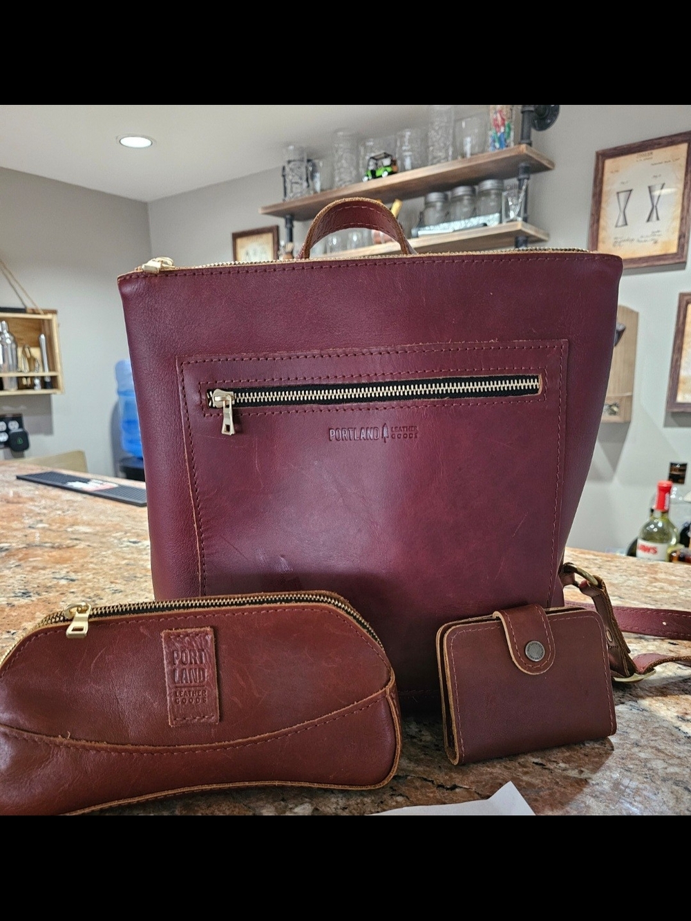 Portland Leather Goods Large Tote Backpack in Chestnut with two "Littles"